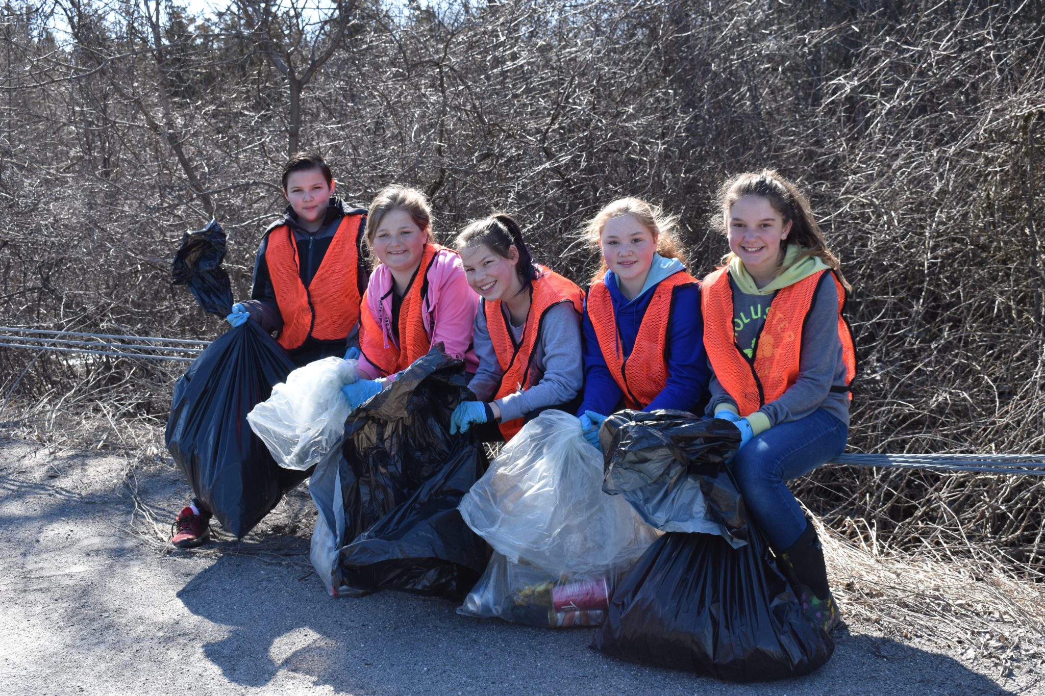 <p>service with a smile Local youth team up to clean a section of County Road 22 in 2018. This weekend sees a return of a community clean up in Prince Edward County as well as a seedling sale and info sessions sustainable planting.  (Jason Parks/Gazette file photo)</p>
