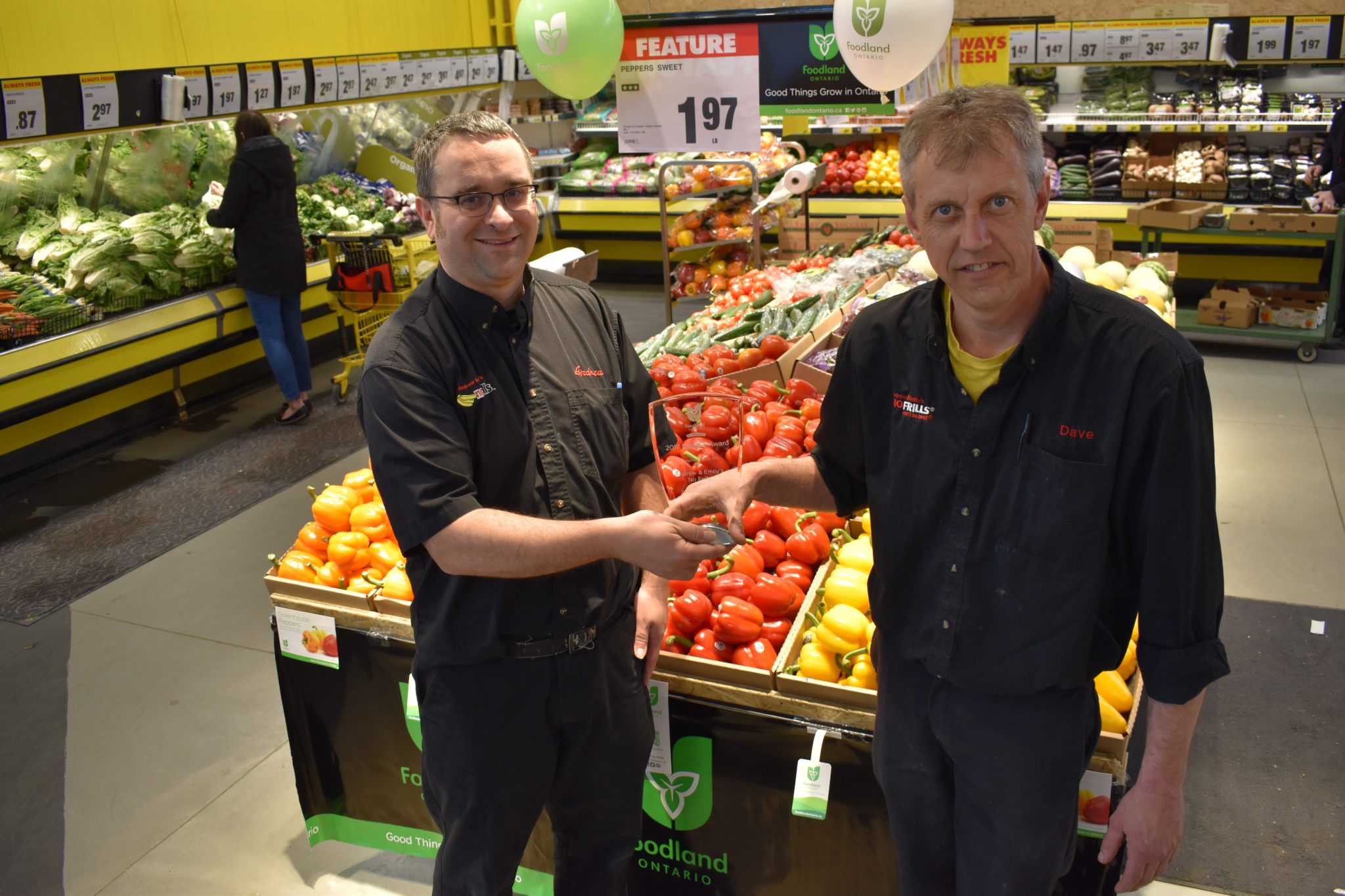 <p>PROVINCIAL AWARD WINNERS- Picton No Frill’s store owner Andrew Januszkiewicz and Produce Manager Dave Wright show off the 2018 Foodland Ontario Platinum Retailers award. The store was recognized for the promotion of local and Ontario-grown produce. (Jason Parks/Gazette Staff)</p>
