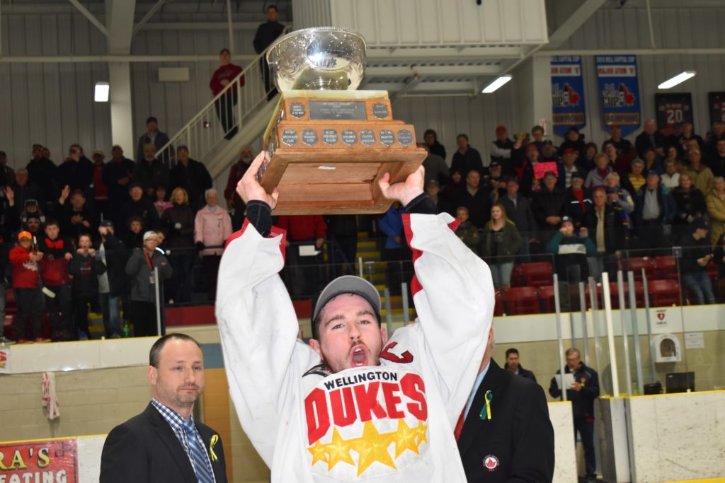 <p>SIMPLY THE BEST- Wellington Dukes captain Colin Doyle hoists the Buckland Cup Sunday night at Essroc Arena after his team beat the Georgetown Raiders in Game 6 of the 2018 Ontario Junior Hockey League finals. (Jason Parks/Gazette Staff)</p>
