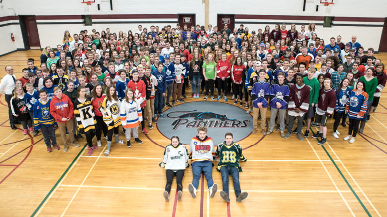 <p>PECI staff and students showed their strong support for the Humboldt Broncos as part of Jersey Day last Thursday. Amid a sea of colours, including those of their school and local sports teams, there were also a pair of authentic Broncos sweaters at the school as Sydney Davies and Thomas Davies were able to borrow those worn by their cousin Joey, who played for the Saskatchewan team in 2011-2012 and 2012-2013.  (Submitted photo)</p>
