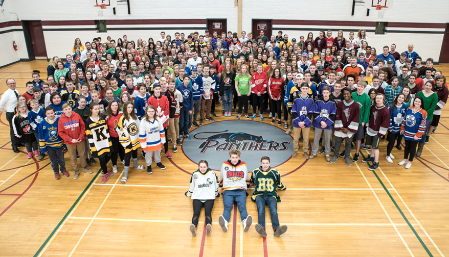 <p>PECI staff and students showed their strong support for the Humboldt Broncos as part of Jersey Day last Thursday. Amid a sea of colours, including those of their school and local sports teams, there were also a pair of authentic Broncos sweaters at the school as Sydney Davies and Thomas Davies were able to borrow those worn by their cousin Joey, who played for the Saskatchewan team in 2011-2012 and 2012-2013.  (Submitted photo)</p>
