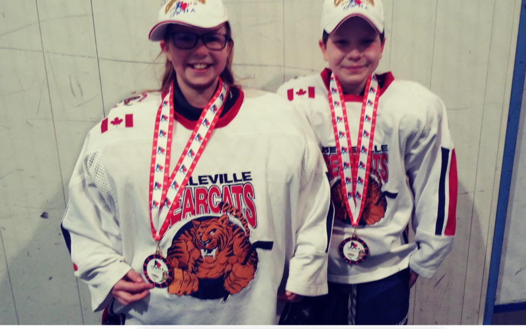 <p>SISTERS IN ARMS- County natives (From left) Brylie Renaud and Taylor Wood capped off their 2017-18 season with an Atom A Ontario Women’s Hockey Association championship. (Submitted Photo)</p>
