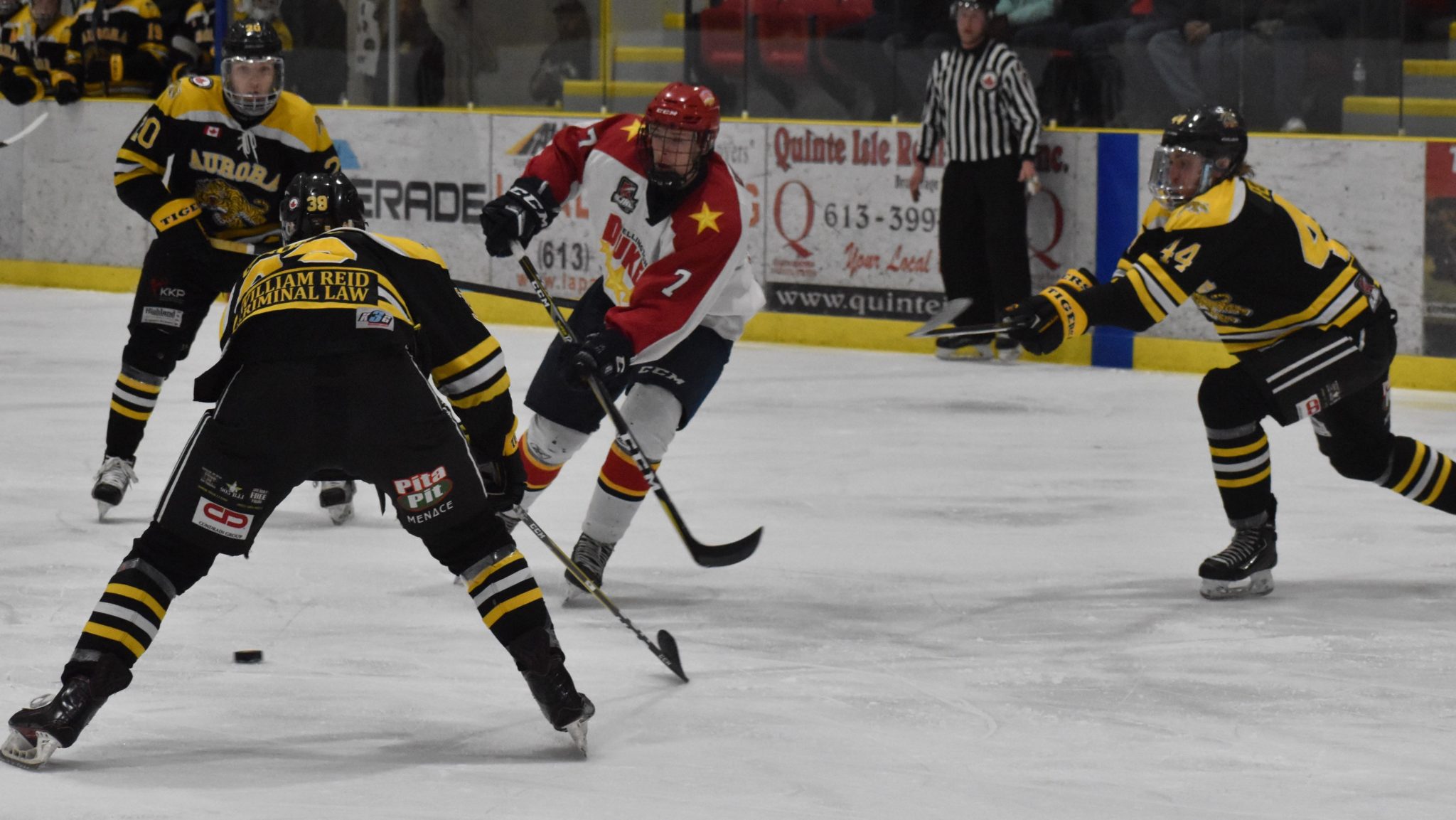 <p>BACK TO THE BUCKLAND FINALS- Wellington Duke defenceman Zach Uens evades three members of the Aurora Tigers during Game 4 of the OJHL Northeastern Conference Finals Friday night. Uens score the series winning goal in double overtime in Game 5 on Sunday. (Jason Parks/Gazette Staff)</p>
