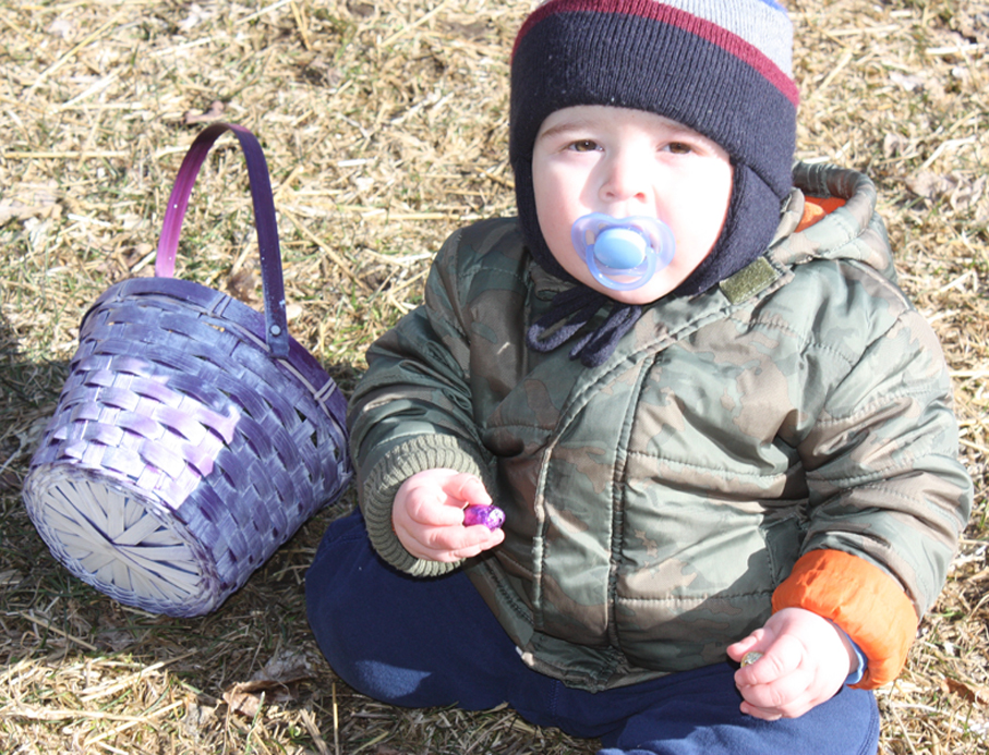 <p>.At just 14 months old, Sam Lewis was able to handle mini chocolate easter eggs at the seventh annual  Prince Edward County Junior Farmers Easter egg hunt at Wilhome Farms near Bloomfield Saturday.  Eating them was another story,  The event was well attended with children of all ages participating. (Jason Parks/Gazette staff)</p>
