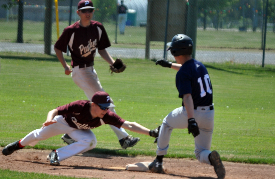 <p>Race to the bag  -Panthers second baseman Jordan Stacey lunges to tag a St. Mary runner as shortstop John McHugh looks on.  The infielders are two of six graduating vets who will be missed. (Adam Bramburger/Gazette staff)</p>
