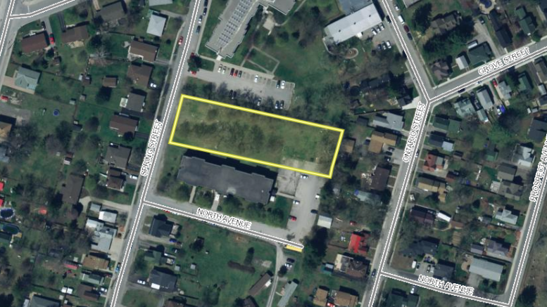 <p>The lands outlined in yellow denote the proposed location of the residential apartment development. (County GIS image)</p>
