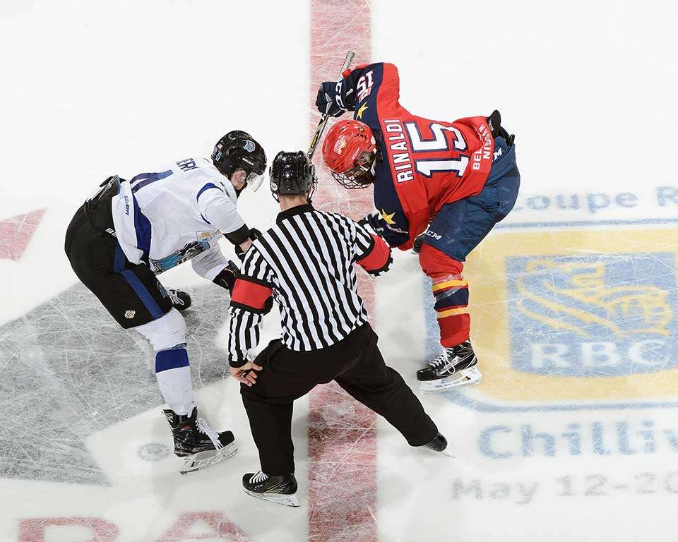 <p>Wellington’s Andrew Rinaldi faces off against Wenatchee Wild centre Jasper Weatherby Thursday. (Matthew Murnaghan/Hockey Canada Images)</p>
