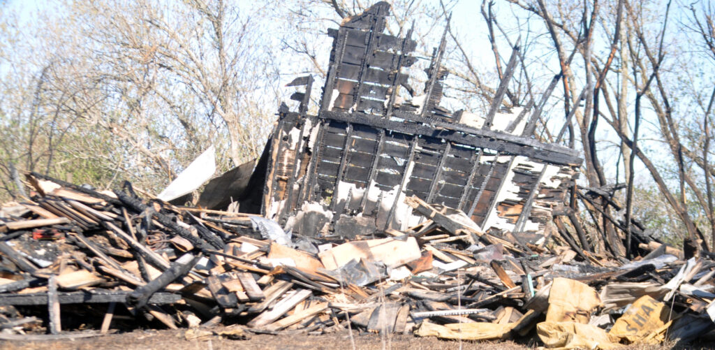 <p>Suspicious blaze – Prince Edward OPP officers were called to Fish Lake Road Saturday morning to investigate the cause of a structure fire at this abandoned house. (Adam Bramburger/Gazette staff)</p>
