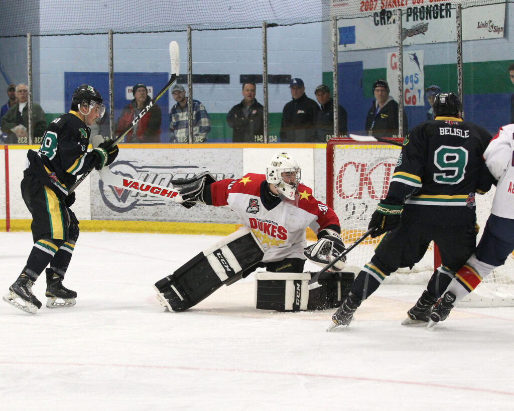 <p>HOLDING ON- Joel Willan of the Thunder Bay North Stars grabs Jonah Capriotti’s stick in the first period of Game 3 of the Central Canadian Junior Championships Wednesday afternoon. Capriotti and the Wellington Dukes won the game 4-1. (Photo by Tim Bates/DHC via OJHL Images)</p>
