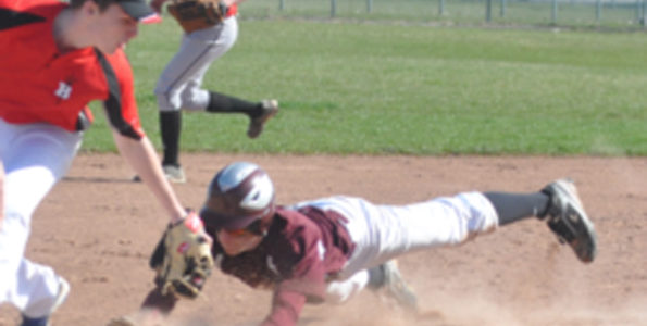 <p>Safe at third – PECI Panther Chase Lavender reaches the base under           the tag of a Bayside Red Devil Monday. Lavender has been a productive offensive contributor early in the year. (Adam Bramburger/Gazette staff)</p>
