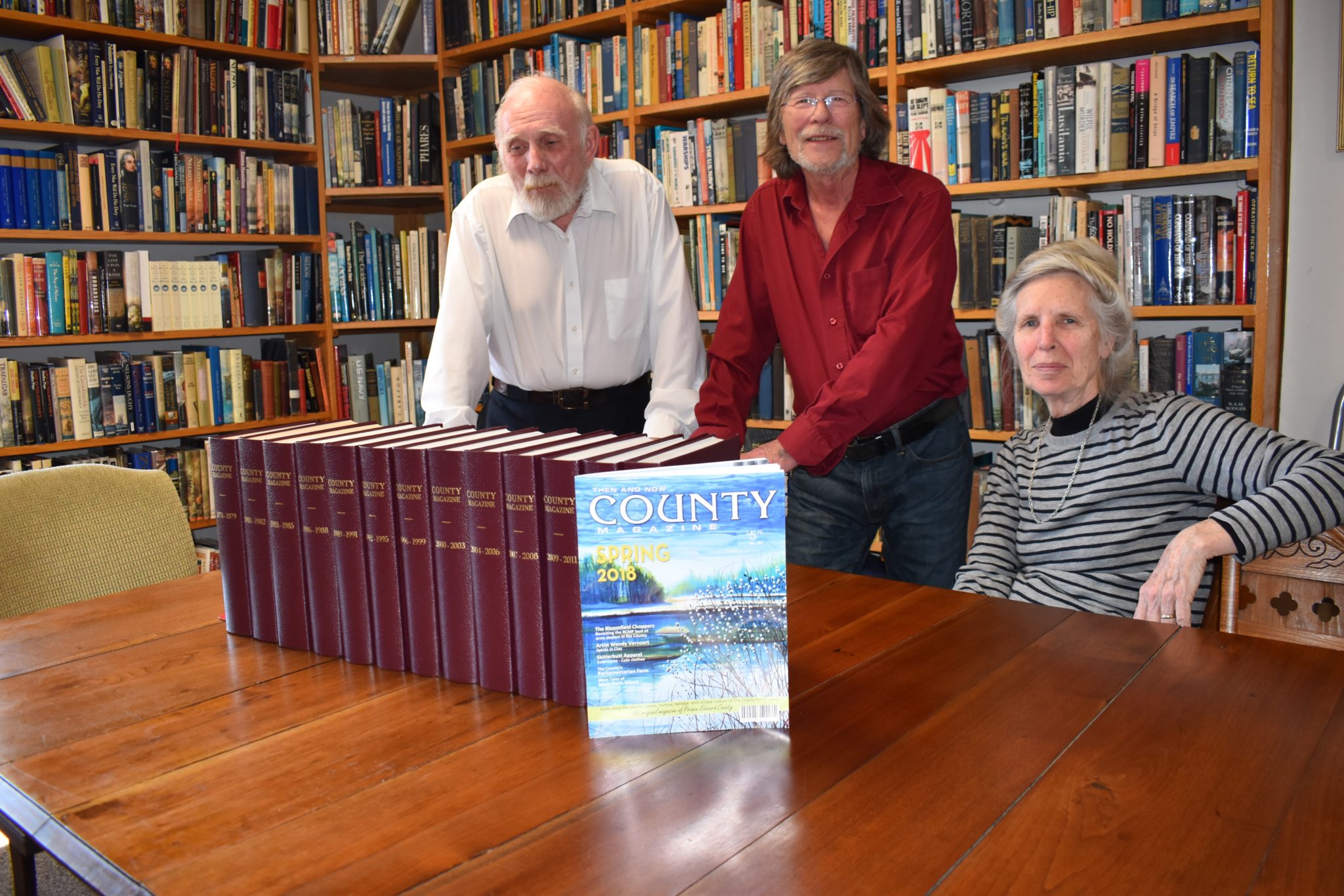 <p>CAPTURING THE COUNTY- All 166 editions of the County Magazine are bound and prepared for public perusal thanks to the Victory Naval Marine Archive and a Municipal Community Grant. Pictured at the collections unveiling Monday are (From Left) Paul Adamthwaite, curator of the Victory, County Magazine publisher and editor Steve Campbell and Betty Anne Anderson of the Victory. (Jason Parks/Gazette Staff)</p>
