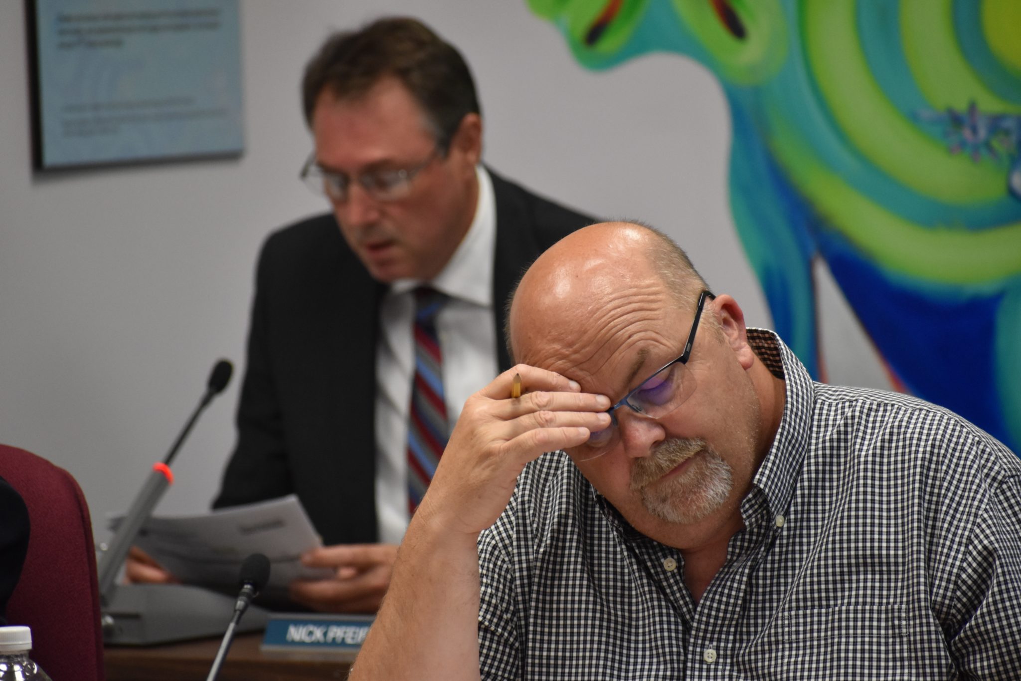 <p>BACK ON TRACK- Prince Edward South Public School Board Trustee Dwayne Inch listens to Hastings and Prince Edward District School Board Superintendent of Business Services Nick Pfeiffer present the 2018-19 budget Monday night at the Education Centre in Belleville. (Jason Parks/Gazette Staff)</p>
