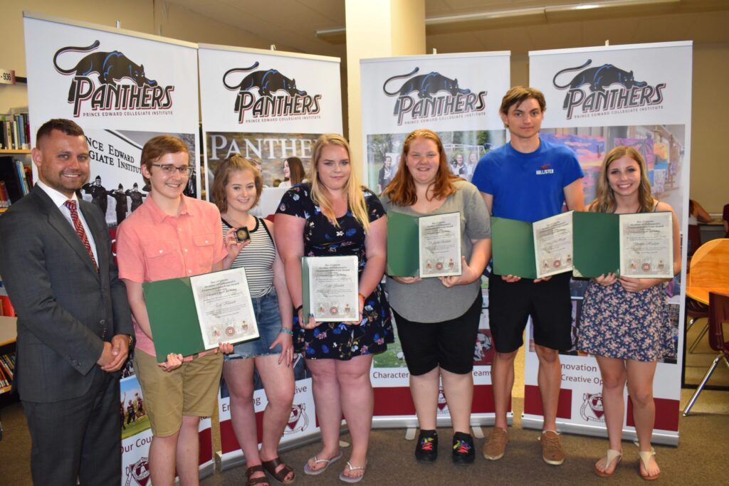 <p>CANADA 150 AWARD WINNERS- (Left) Ben Howe, executive assistant to Bay of Quinte MP Neil Ellis, presented Canada 150 medals and certificates to PECI students (From Left) Eric Klassen, Abby Heffernan, Ruby Gaudett, Katherine Reddick John McHugh and Brooke Hudgin. (Jason Parks/Gazette Staff) </p>
