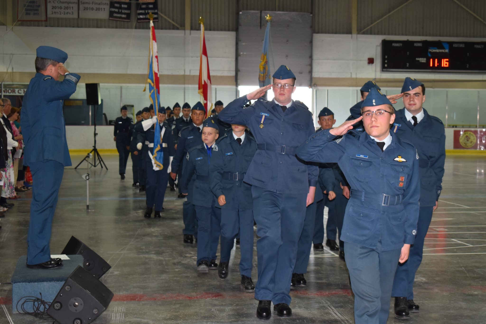 <p>Squadron Warrant Officer Aaron Wiik leads the 851 Prince Edward Squadron of the Royal Canadian Air Cadets past reviewing officer Col. C. Daniel Harris at Saturday’s Ceremonial Review at the Prince Edward Community Centre. (Jason Parks/Picton Gazette)</p>
