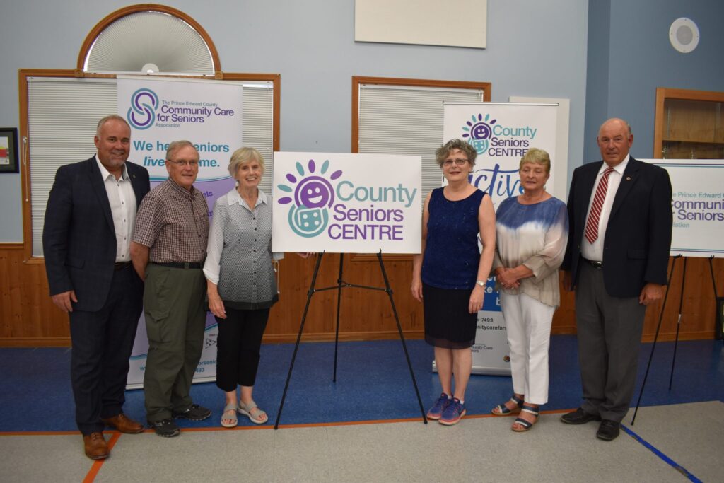 <p>A NEW LOOK, A NEW DAY- The CountySeniors Centre will is a multi-site social and recreational outreach program under the auspices of the Community Care for Seniors Association that will be coming to a Town Hall near you. Pictured at Friday’s logo unveiling at North Marysburgh Town Hall are (From left) Bay of Quinte MPP Todd Smith, Community Care Director Ken Laycock, past president Marg Werkhoven, Executive Director Debbie MacDonald Moynes, President and Chair Barb Proctor and North Marysburgh Councillor David Harrison. (Jason Parks/Gazette Staff)</p>
