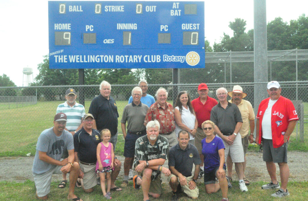 <p>MOVING DAY? – Members of the Rotary Club of Wellington, County council, and Prince Edward County Minor Baseball show off the new scoreboard at the Field of Dreams complex in July 2018. (Adam Bramburger/Gazette File Photo)</p>
