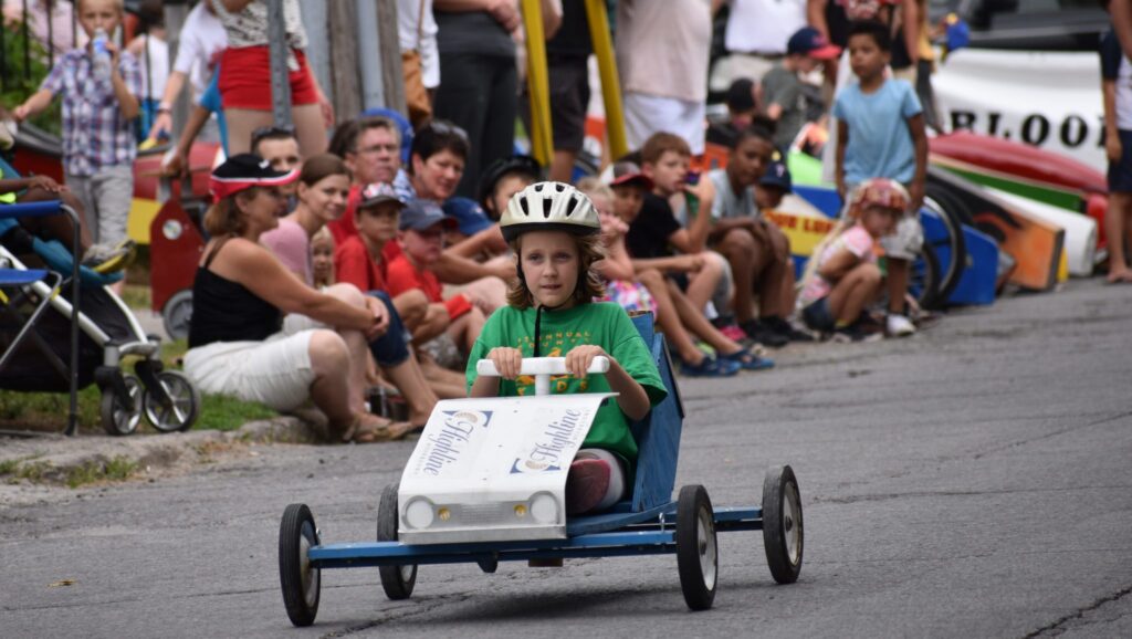 <p>CHARIOTS OF FIRE- Lena Arthur negotiates the hill on Mill St. during the 2018 Bloomfield/Hallowell Recreation Committee Soap Box Derby on Saturday. (Jason Parks/Gazette Staff)</p>
