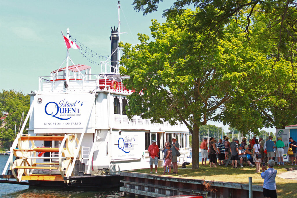 <p>The Island Queen awaits as passengers line up to register for the afternoon cruise on July 5. (Chad Ibbotson/Gazette staff)</p>

