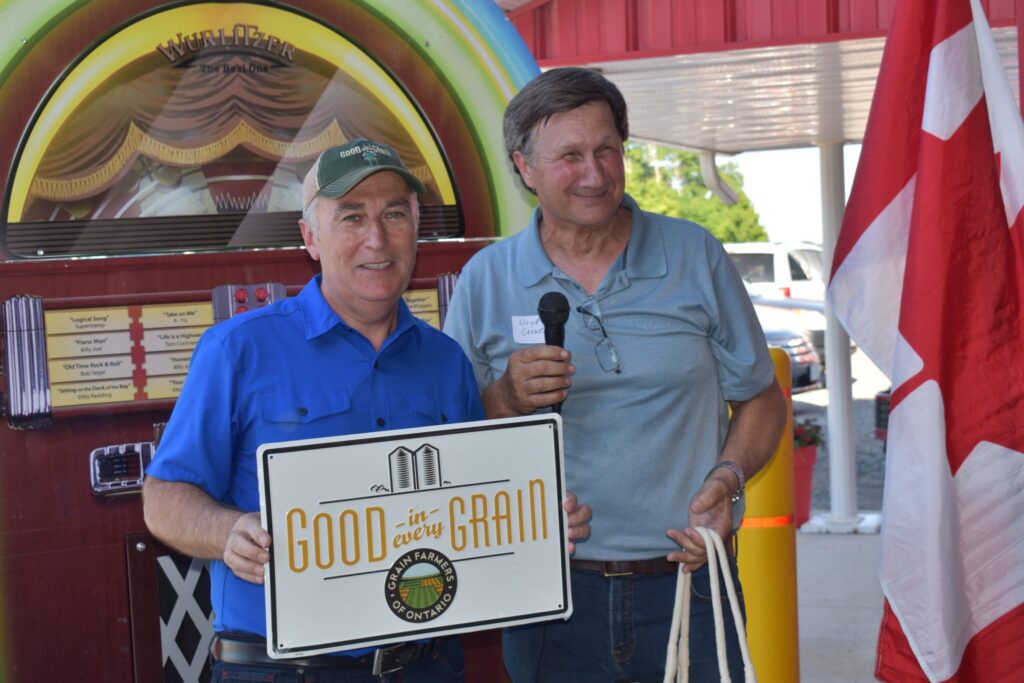 <p>SEED MONEY- (LEFT) Bay of Quinte MP Neil Ellis announced funding for Risk Management projects at Reynolds Brothers Farms on Wednesday. Presenting Ellis with Grain Farmers of Ontario materials is GFO director Lloyd Crowe. (Jason Parks/Gazette Staff)</p>
