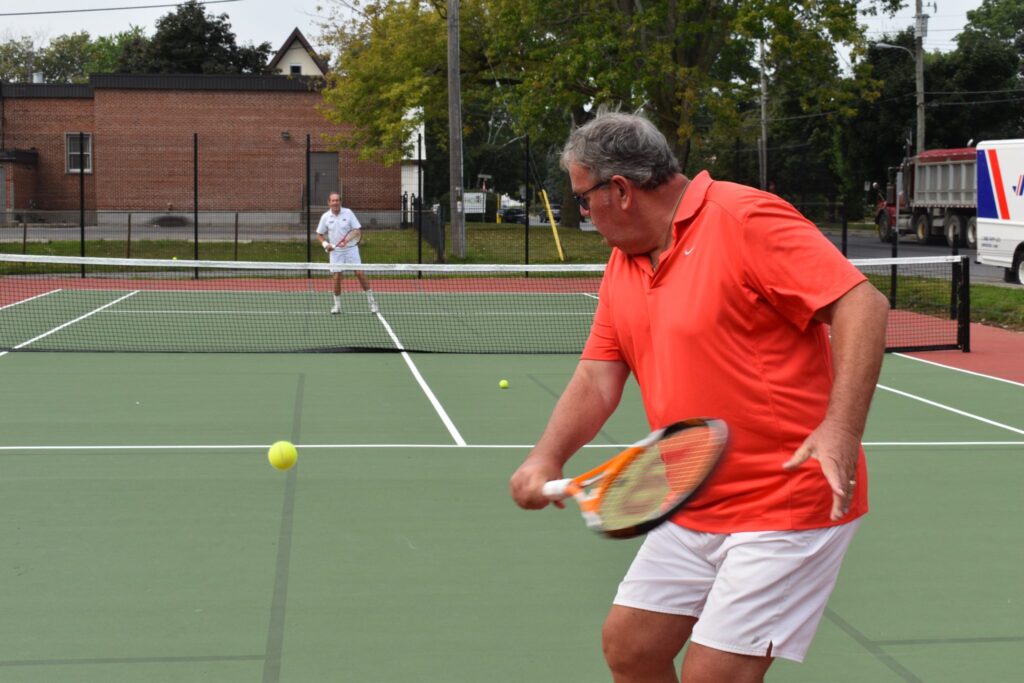 <p>SERVING UP SUPPORT- Herb Pliwischkies returns a volley from Canadian Tennis Hall of Fame inductee John Beddington at the newly refurbished Benson Park tennis court on Monday. Pliwischkies, with the support of Beddington and others, is championing a local youth tennis program next spring. (Jason Parks/Gazette Staff)</p>
