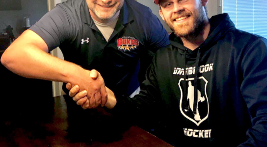 <p>Wellington Dukes General Manager Todd Reid and former netminder Olivier Lafreniere in 2019. (Wellington Dukes photo)</p>
