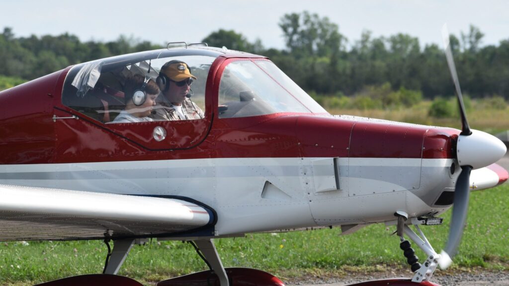 <p>UP, UP AND AWAY- Local pilot Jeff Douglass prepares to take a COPA for Kids participant into the wild blue yonder Saturday morning. (Jason Parks/Gazette Staff)</p>
