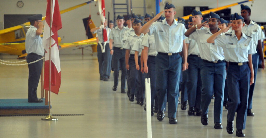<p>Advancing – Royal Canadian Air Cadets participating in the Central Region Glider Pilot Scholarship Course march past reviewing officer Lt.-Col. Steve Camps as part of Friday’s Wings Parade at CFD Mountain View. (Adam Bramburger/Gazette staff)</p>
