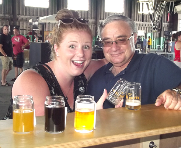 <p>Buds with suds – Katie Heath, of Picton, visited with Rich Kennedy of Cherry Hill, NJ as he sampled beer from Grain & Grit Beer Company of Hamilton during the True North Beer Festival Saturday. (Terry McNamee/For The Gazette)</p>
