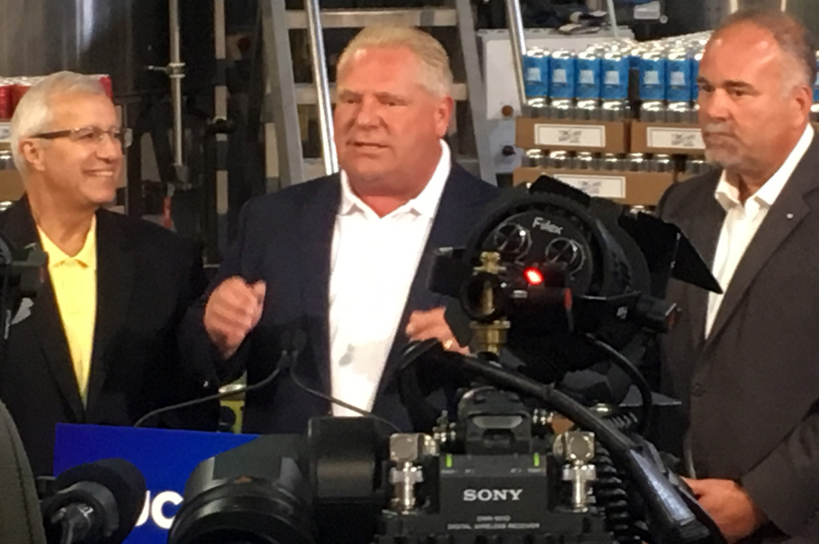 <p>A NEW COURSE-  (From Left) Outgoing Finance Minister Vic Fedeli, Premier Doug Ford and Bay of Qunite MPP Todd Smith at Barley Days Brewery last summer. Smith is taking on a new role in the Ontario government. (Adam Bramburger/Gazette file photo)</p>

