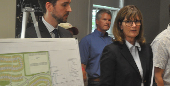 <p>Sharing details – Planning consultant Ruth Ferguson Aulthouse answers questions about a proposed 337-site trailer campground expansion at Quinte’s Isle as legal counsel Patrick Harrington, left, and proponent Tim Ward look on at Athol Town Hall. (Adam Bramburger/Gazette staff)</p>

