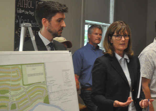 <p>Sharing details – Planning consultant Ruth Ferguson Aulthouse answers questions about a proposed 337-site trailer campground expansion at Quinte’s Isle as legal counsel Patrick Harrington, left, and proponent Tim Ward look on at Athol Town Hall. (Adam Bramburger/Gazette staff)</p>
