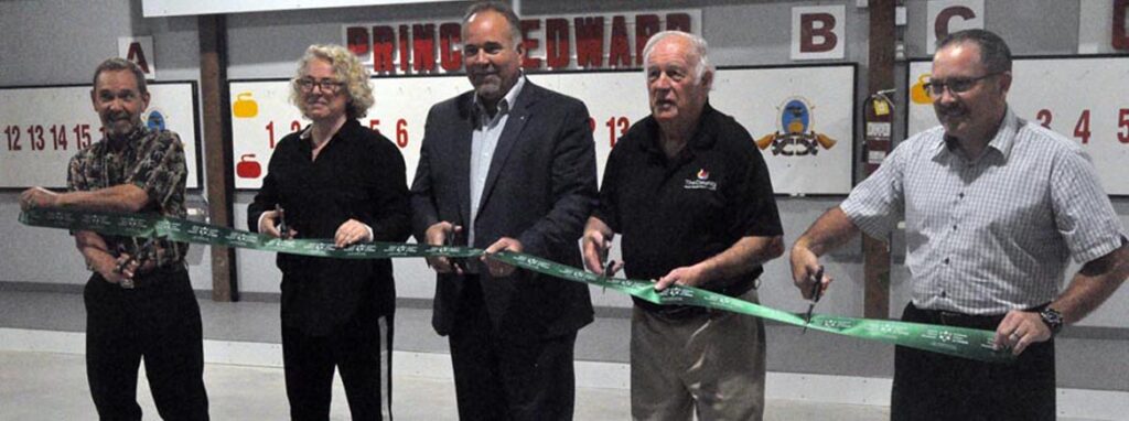 <p>On sound footing – Prince Edward Curling Club vice-president Tom Dmytar, Ontario Trillium Foundation granting committee member Sharlene Weitzman, Bay of Quinte MPP Todd Smith, councillor Barry Turpin and the club’s president Ron Stakes cut the ribbon to celebrate floor and ice-making improvements. (Adam Bramburger/Gazette staff)</p>
