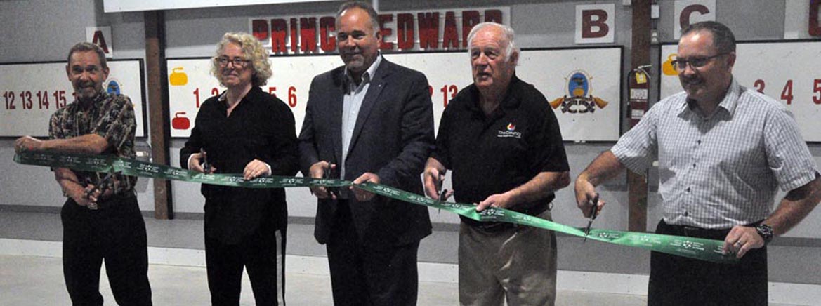 <p>On sound footing &#8211; Prince Edward Curling Club vice-president Tom Dmytar, Ontario Trillium Foundation granting committee member Sharlene Weitzman, Bay of Quinte MPP Todd Smith, councillor Barry Turpin and the club’s president Ron Stakes cut the ribbon to celebrate floor and ice-making improvements. (Adam Bramburger/Gazette staff)</p>
