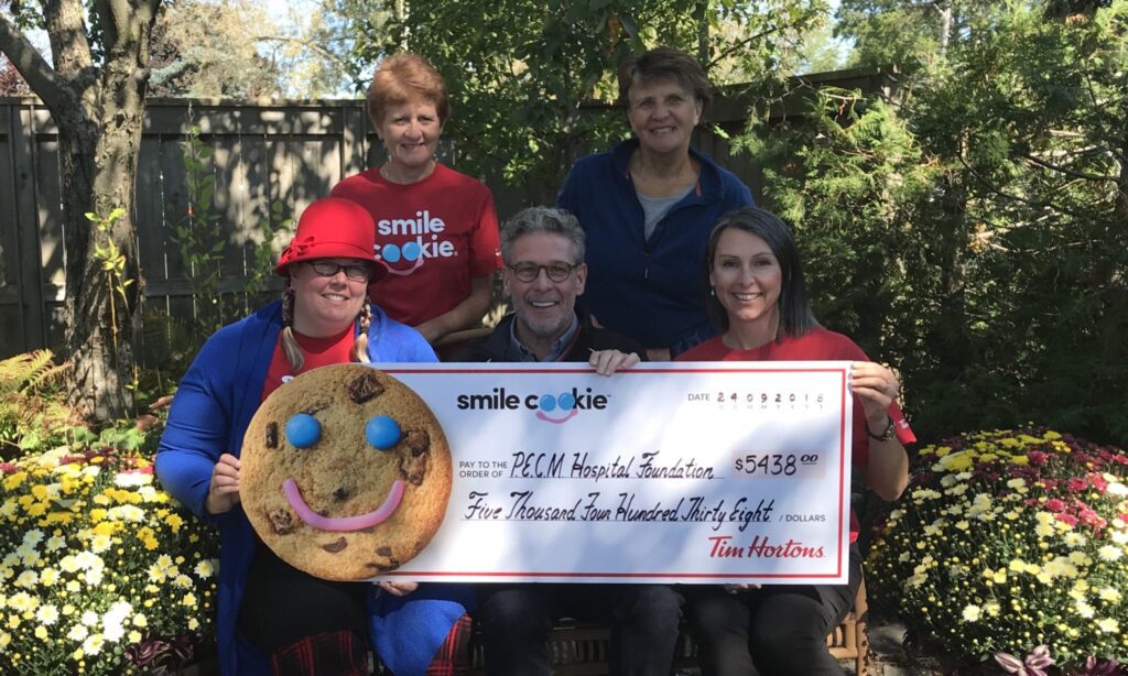 <p>SMILE TIME-  The Smile cookie campaign at Tim Horton’s netted the Prince Edward County Memorial Hospital Foundation over $5,000 for priority medical equipment. Pictured at a cheque presentation Monday are (Back, from left) PECMHF Campaign Manager Marthe Robertson, PECMHF Chairperson Monica Alyea (Front) PECMHF Communications Co-ordinator Briar Boyce, Tim Hortons Owner, Paul Massey and PECMHF Executive Director, Shannon Coull. (Submitted Photo)</p>
