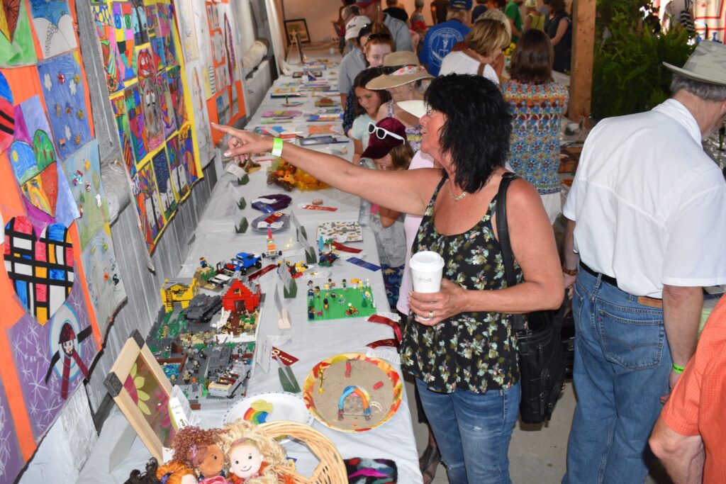 <p>FUN AT THE FAIR- Despite the stifiling heat outside, the Shed at the Milford Fairgrounds was a hive activity at the 72nd annual Milford Fair  Saturday. (Jason Parks/Gazette Staff)</p>
