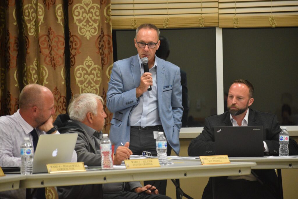 <p>IN THE SHORT TERM- County of Prince Edward Manager of Planning Paul Walsh speaks to the Short Term Accommodation draft amendment and bylaw Monday evening. Also pictured are (from left) Councillors Steve Graham and Roy Pennell and consultant Greg Bender. (Jason Parks/Gazette Staff)</p>
