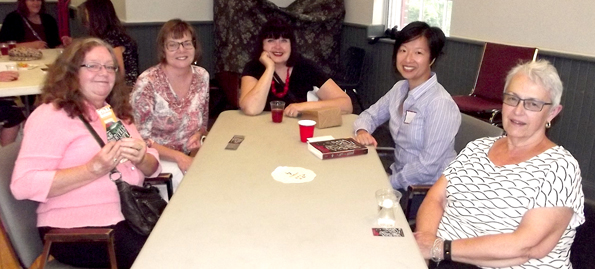 <p>Book banter &#8211; Fans and authors mingled during the first day of the three-day Women Killing It Crime Writers&#8217; Festival in Picton on Friday, Aug. 31. Pictured from left are Carolee Awde of Peterborough, Heather Rule of Bath, Celine Papizewska from Bloomfield, writer Y.S. Lee, and Kingston resident Anita Brunet. (Terry McNamee/For The Gazette)</p>
