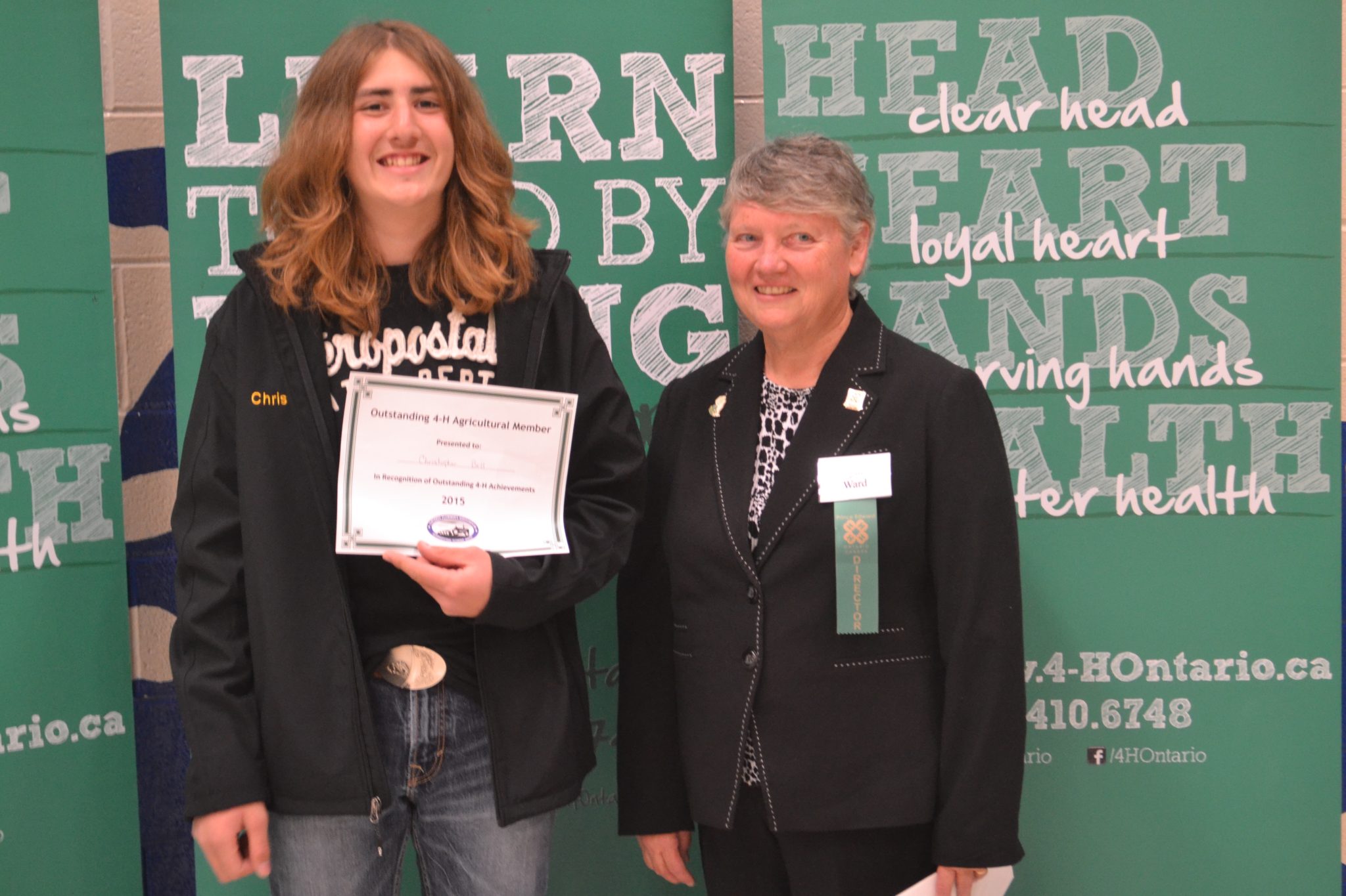 <p>OUTSTANDING IN HER FIELD- (Right) Lynn Ward presents an award to Chris Bell at the 2015 Prince Edward County 4H awards. Ward has been selected to join the honourees at Farmtown Park&#8217;s Quinte Agricultural Wall of Fame next weekend. (Jason Parks/Gazette file photo)</p>
