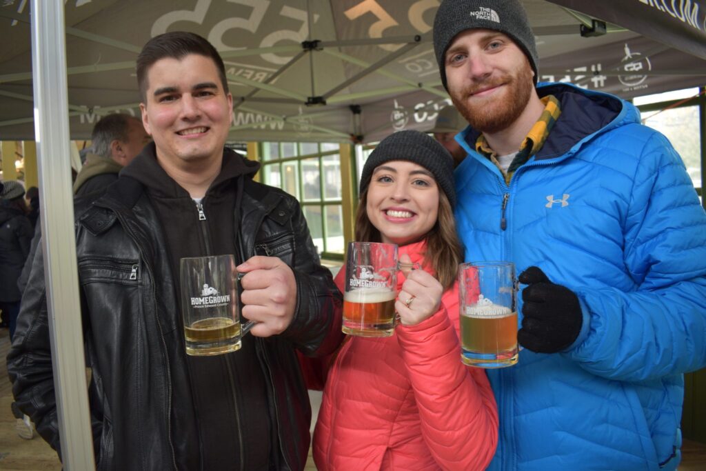 <p>CHEERS TO CRAFT BEER (From left) Bob Horvath, Jennifer Horvath and Matthew James visited the second annual Homegrown Craft Beer Festival at the Crystal Palace on Saturday. (Jason Parks/Gazette Staff)</p>
