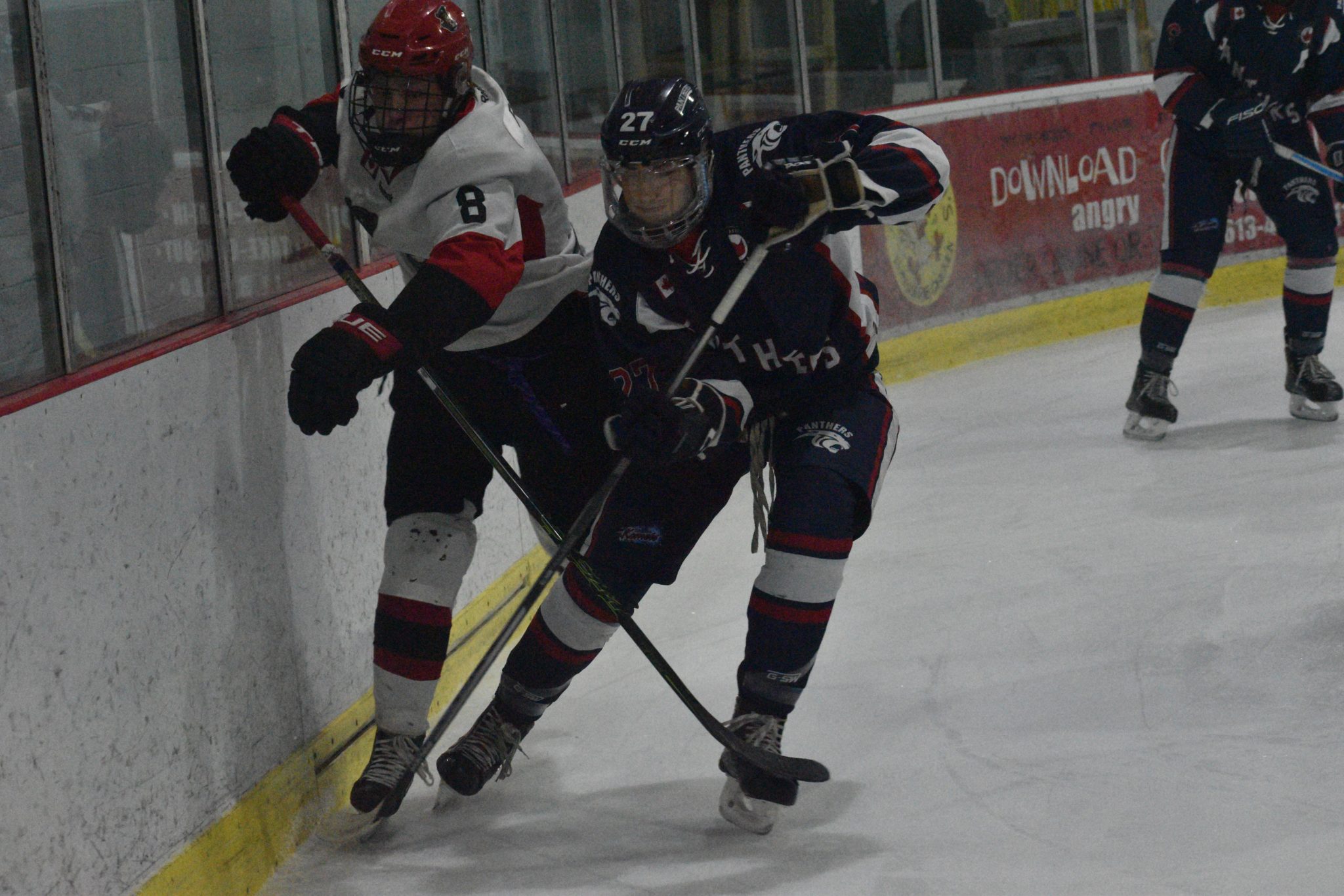 <p>HELD UP- Picton Pirate forward Noah Brant tries to fight through the check of Port Hope Panther defenceman Braydon Crowe. (Jason Parks/Gazette Staff)</p>
