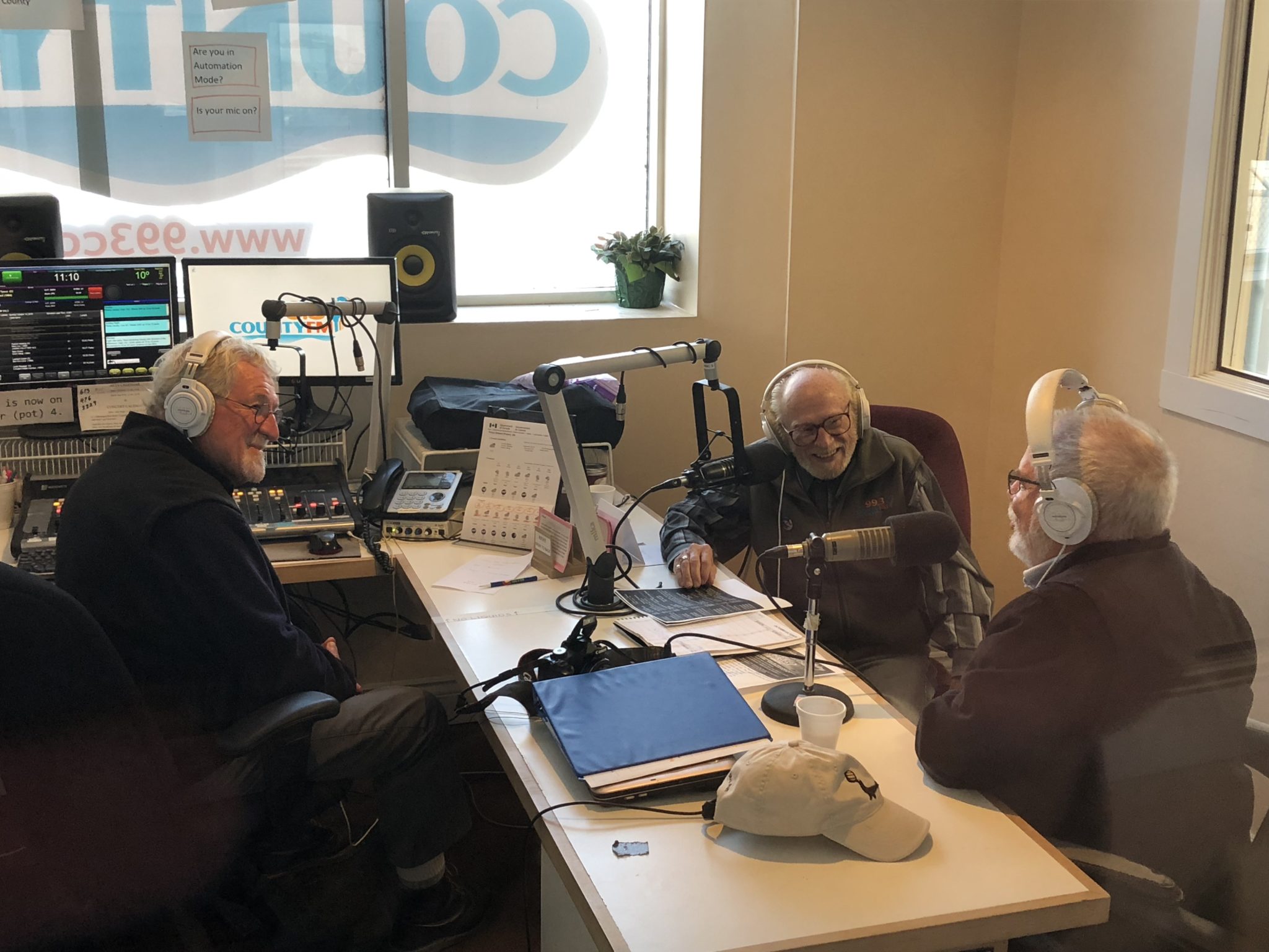 <p>WAKING UP SMILING- (Centre) John Mather holds court at the County 99.3 FM studios Sunday morning and is joined by community radio station volunteers (Left) Terry Culbert and (Right) Treat Hull. (Jason  Parks/Gazette Staff)</p>
