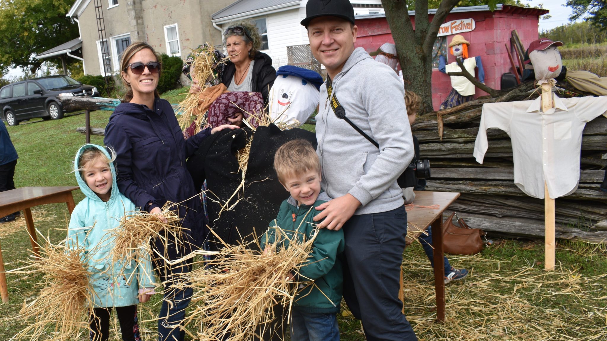 <p>DON’T FORGET THE STUFFING- Crystal Emmets and Dominic Bochenski along with Mason Emmets-Bochenski and Mya Emmets-Bochenski take a break from creating a scarecrow at the eighth annual Scarecrow Festival at Smallpond Arts Centre on Sunday. The Toronto-based family was visiting Prince Edward County this holiday weekend. (Jason Parks/Gazette Staff)</p>
