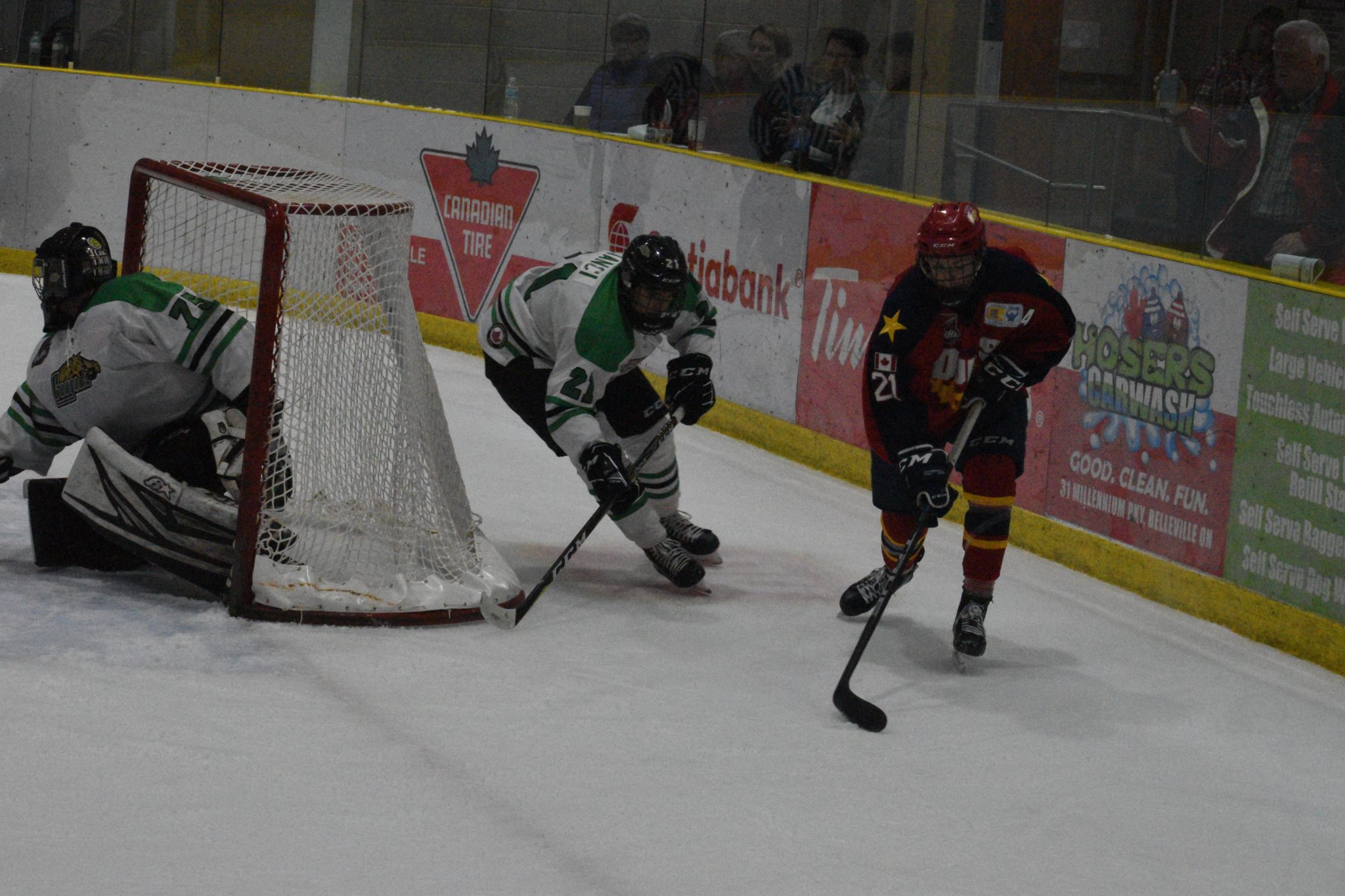 <p>Wellington Duke Dawson Ellis shields the puck from Cobourg Cougar Coleton Cianci. (Jason Parks/Gazette Staff)</p>
