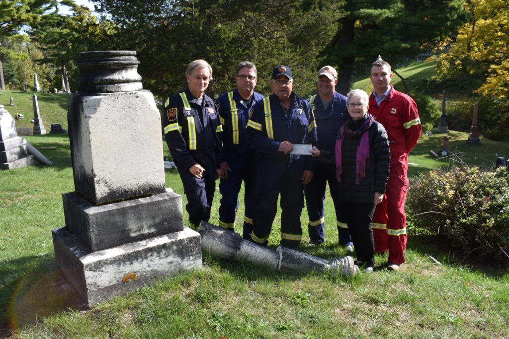 <p>HELPFUL HANDS- Picton Firefighter Association members (From left) Dave Fox, Rob Manlow, Paul Vidito, Jason Young and Matt Stiff present Glenwood Cemetery President Sandy Latchford with a cheque for $1,000. The funds will be utilised in the restoration of the damaged monuments.<br />
(Jason Parks/Gazette Staff)</p>
