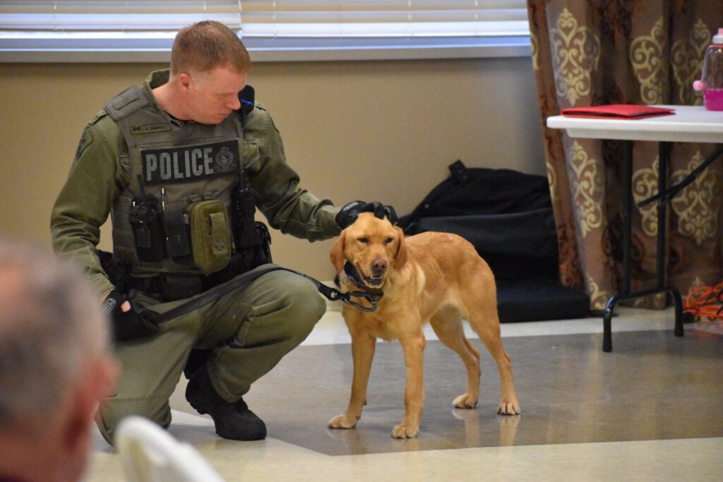 <p>OPP Canine officer Scott Gannon and search and rescue dog Zoe. (Jason Parks/Gazette Staff)</p>
