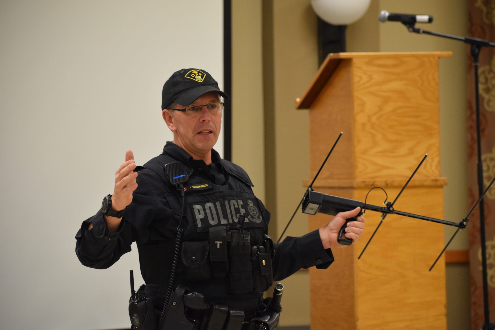 <p>IT’S A LIFESAVER- Prince Edward OPP Constable and Project Lifesaver team lead Troy  Bellehumeur explains the positive aspects of the proactive search program designed for people that are at risk for wandering at the Finding Your Way information session at the Highline Hall in Wellington on Tuesday. (Jason Parks/Gazette Staff)</p>
