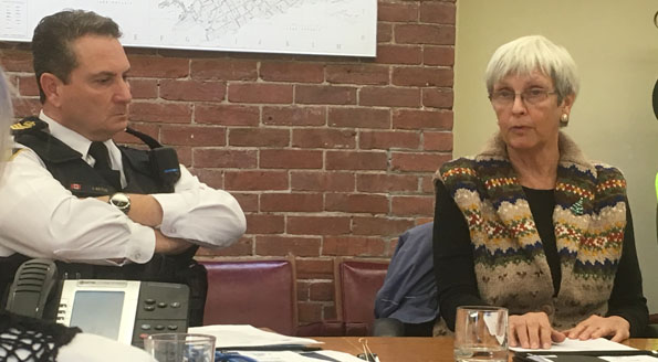 <p>Partners in mental health  – Prince Edward OPP Staff Sgt. John Hatch listens as project co-ordinator Ann McIntosh discusses “A Collaborative Approach to Mental Health”. (Adam Bramburger/Gazette staff)</p>
