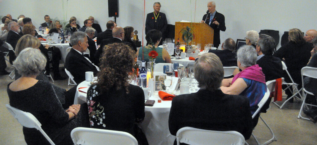 <p>Celebrating service – Past Rotary International president Wilf Wilkinson congratulates Picton Rotarians on their 75th anniversary Thursday night at the CAPE. (Adam Bramburger/Gazette staff)</p>
