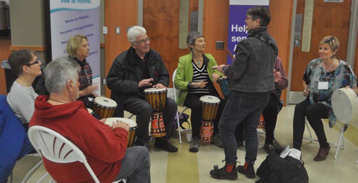 <p>They’ve got the beat -Interactive drumming lessons, presented by the County’s public library system, were just one of the many opportunities for seniors on display at Thursday’s fair. (Adam Bramburger/Gazette staff)</p>
