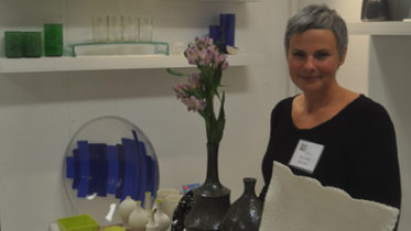 <p>STAYING AT HOME – Michelle Kosoy shows off some of her clay work and husband Pierre Bouchard’s glass work at last year’s Maker’s Hand.  (Adam Bramburger/Gazette file photo)</p>
